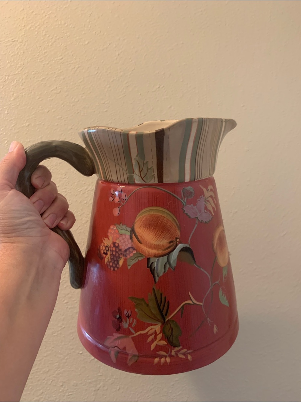 Hand-Painted Red Floral Ceramic Pitcher with Green Handle